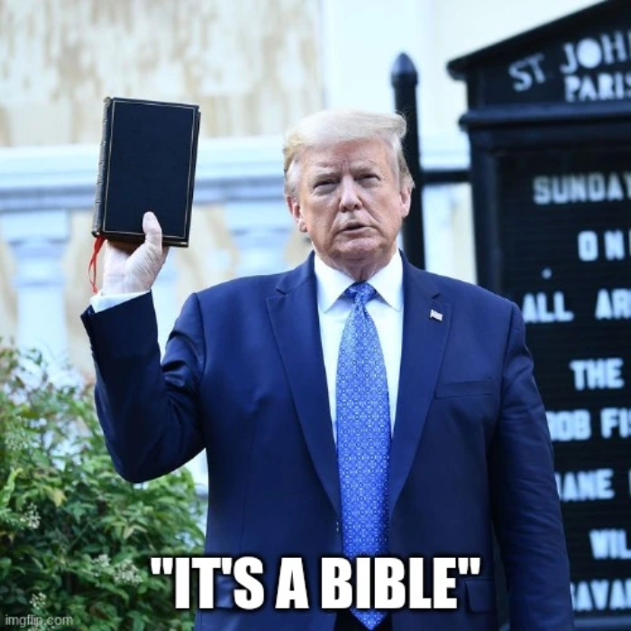 Donald Trump holding a bible.